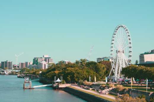 View at South Bank Parklands with a big wheel in Brisbane, Australia.