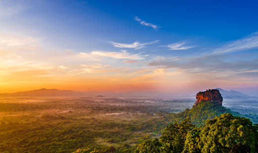 View to Sigiriya rock at the sunrise from Pidurangala rock, near the town of Dambulla in the Central Province, Sri Lanka.

