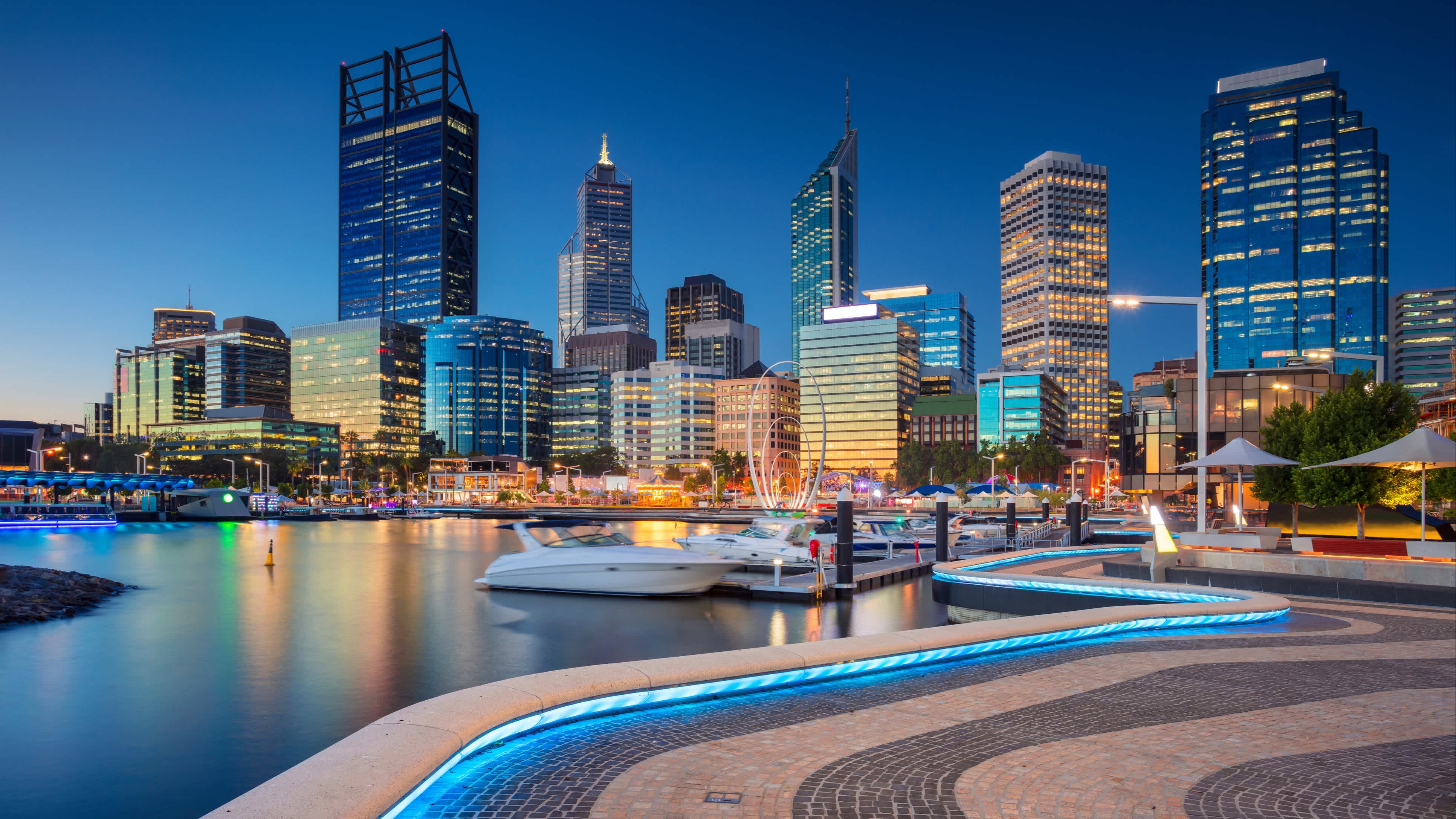 Oceania, Australia, city lights of the Perth skyline and harbor in the late evening. 