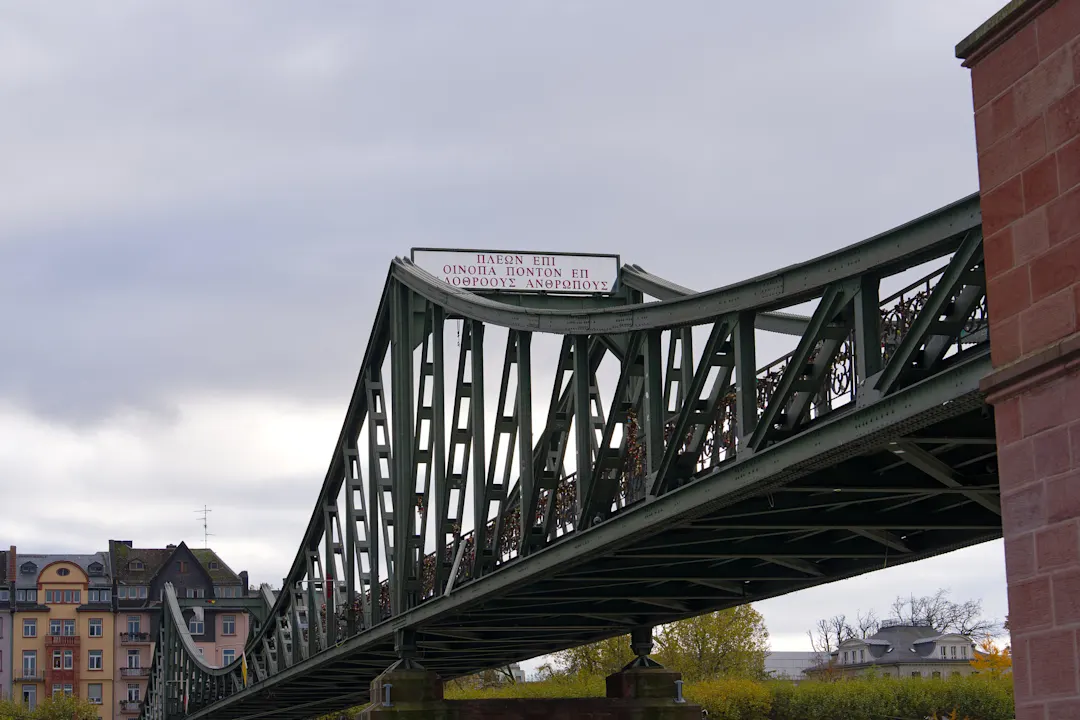 Eiserner Steg footbridge at German city of Frankfurt am Main Cityscape with Main River with Eiserner Steg footbridge at German city of Frankfurt am Main