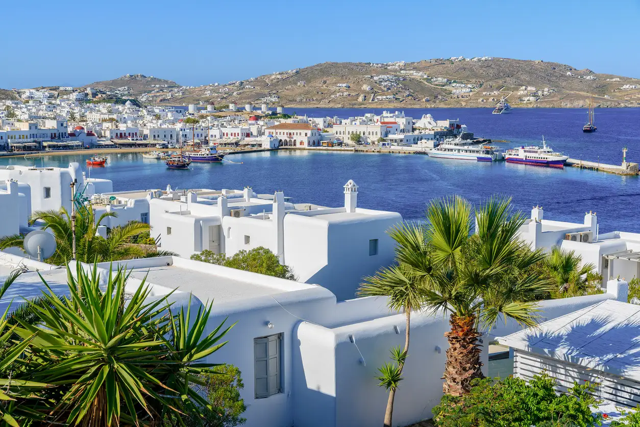 Greece, Cyclades, Mykonos A view of Mykonos harbor and town, Mykonos island, Cyclades, Greece.