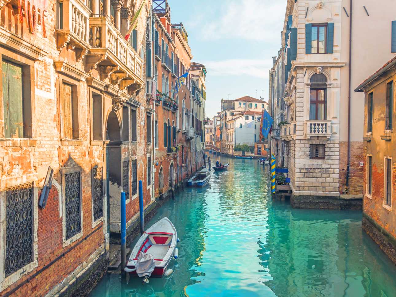 Discover beautiful canals and stunning architecture, pictured here, on a trip to Venice