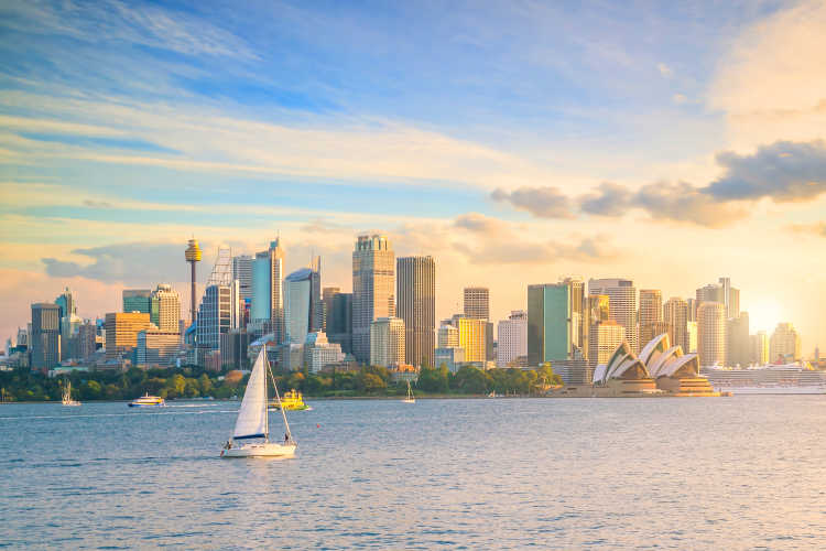 Visit the beautiful city of Sydney, pictured here by the water, on a Sydney vacation
