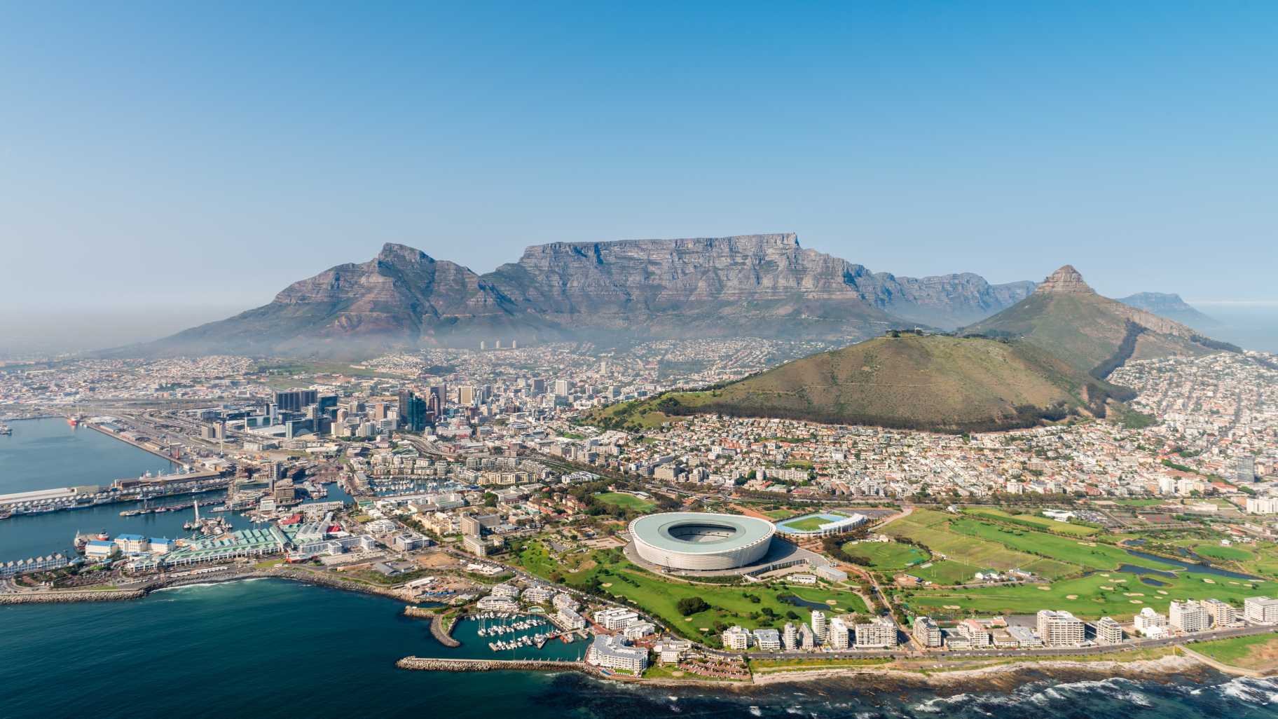 Discover the beautiful city of Cape Town, pictured here from above, on a cape town vacation