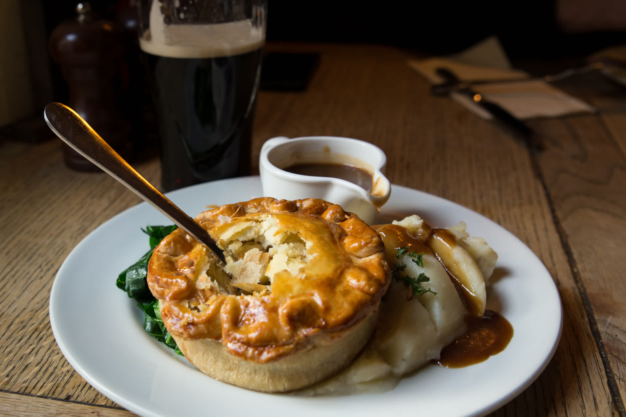 Traditional English chicken pie with gravy sauce. 

