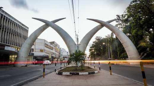 Africa, Kenya, Mombasa, traffic rushes through the Mombasa Tusks.