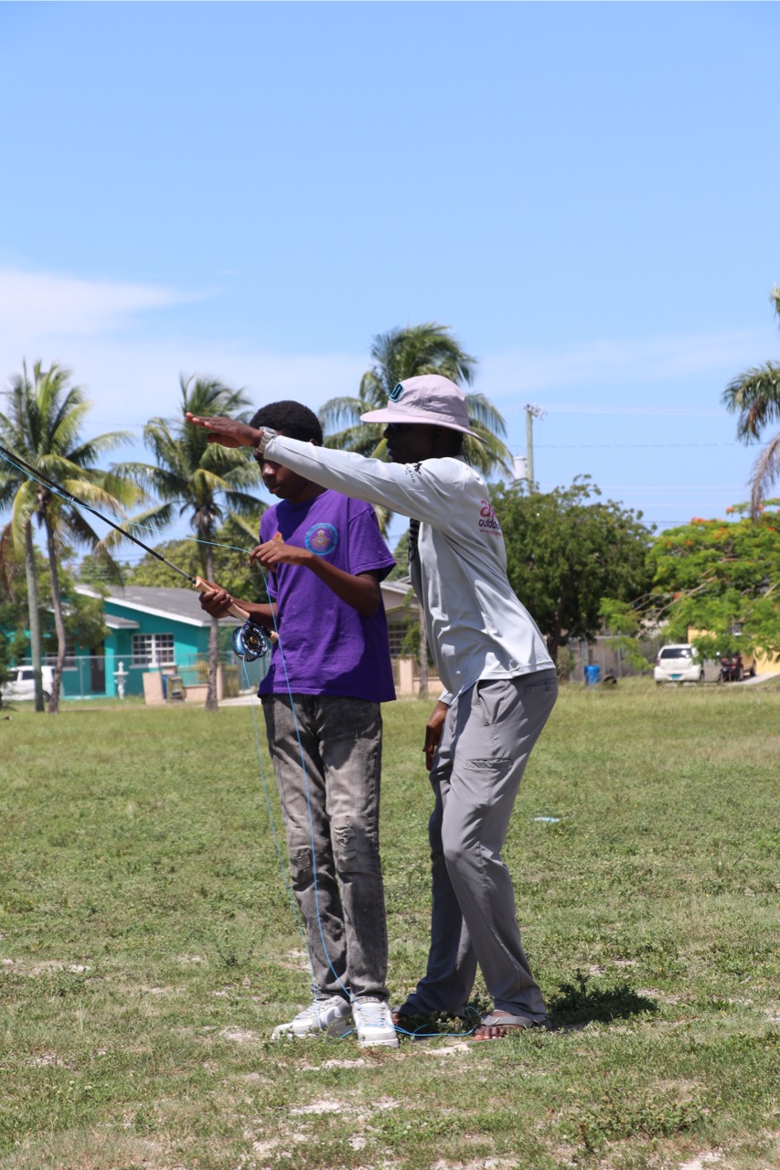 community fly fishing guide teaching how to cast