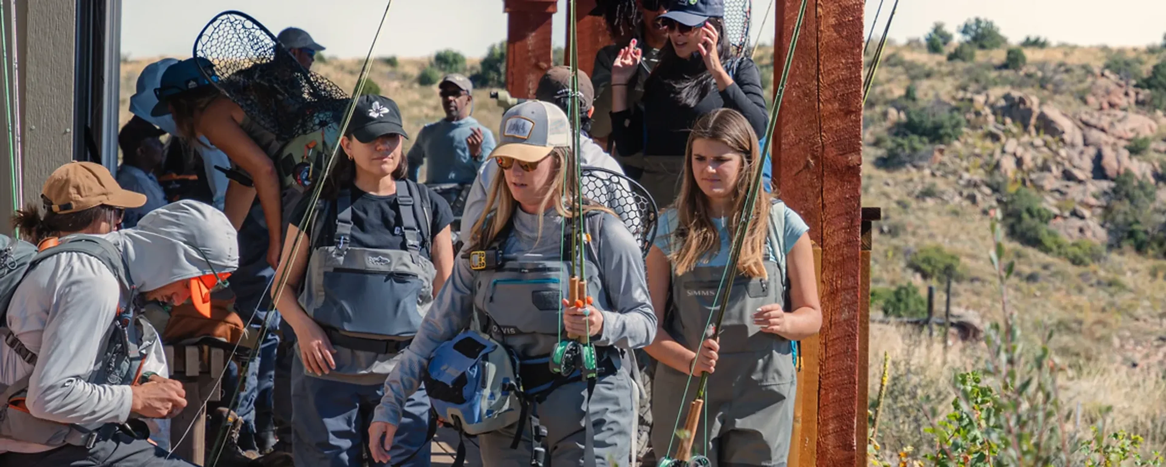 A large group of people getting ready to fish