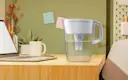 White Tahoe Water Pitcher with Original Filter on desk in dorm room.