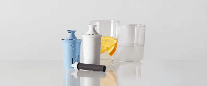 Brita Elite Filter, Original Filter, and Bottle filter on counter, next to two water glasses.