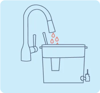 Water being poured into dispenser reservoir through sink faucet.