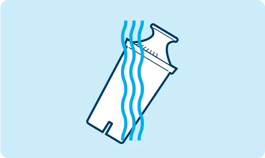 Water filter being rinsed under water.