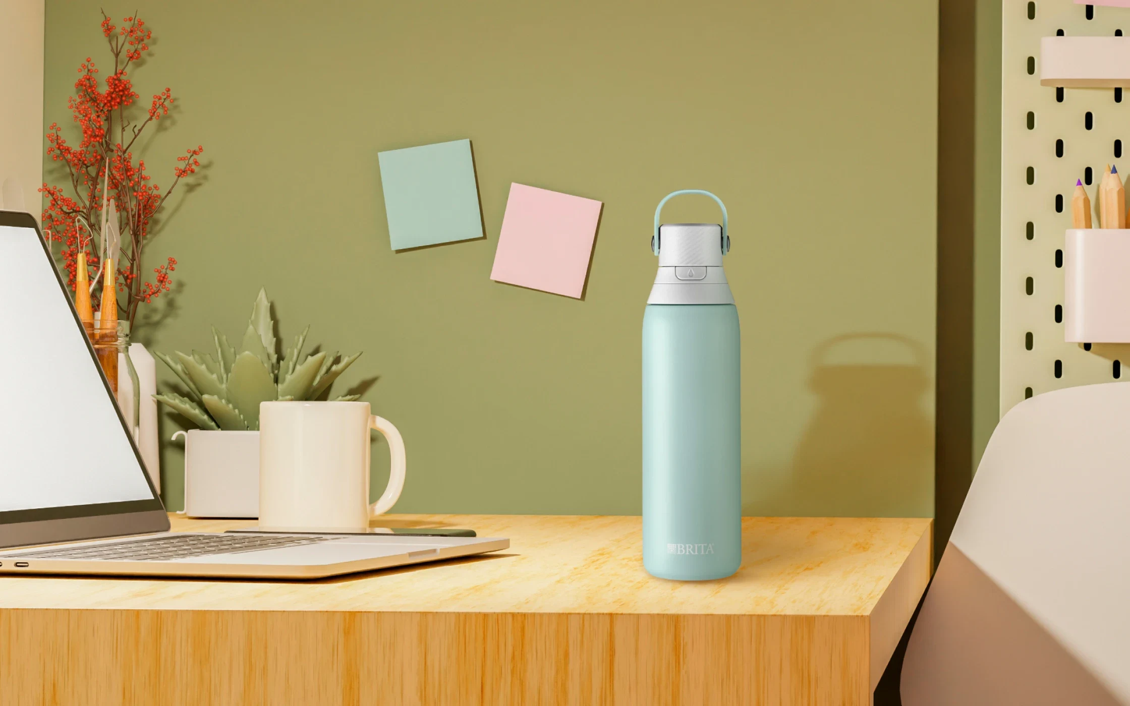 Stainless, Glacier-colored, 20oz premium filtering water bottle on desk in dorm room.