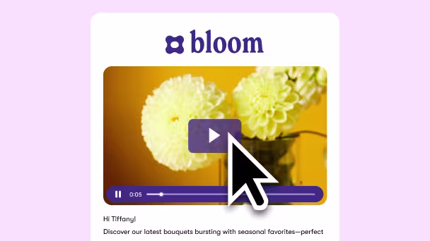 Email builder interface with embedded video thumbnail as a clickable call to action.