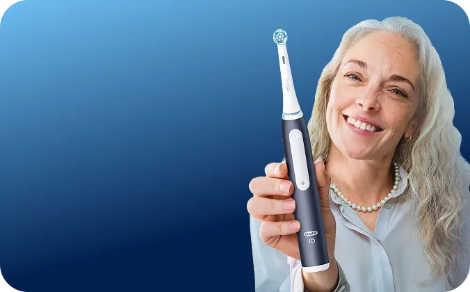 Brush twice daily for two minutes with an electric toothbrush to remove more plaque along the gumline.