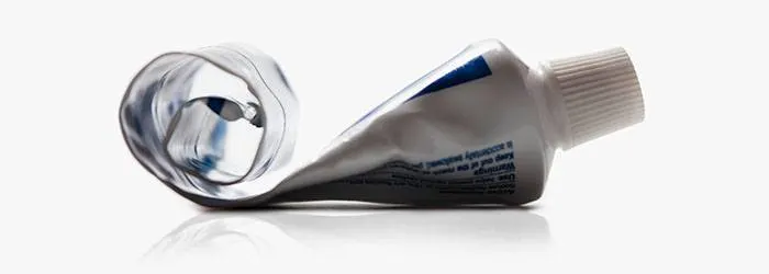 Toothpaste squeezer tips