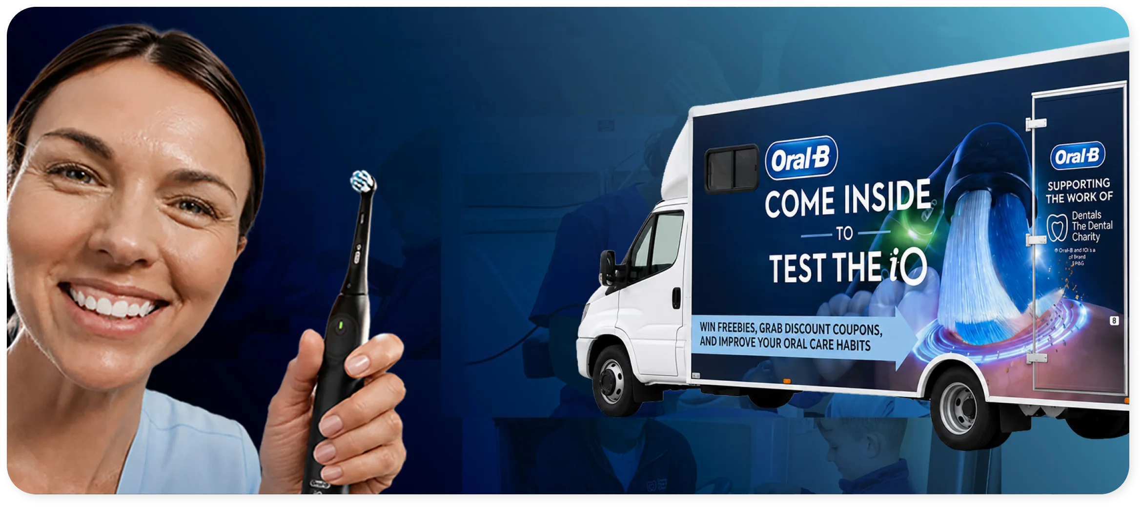 Woman holding an Oral-B iO electric toothbrush beside the Oral-B iO Experience bus 