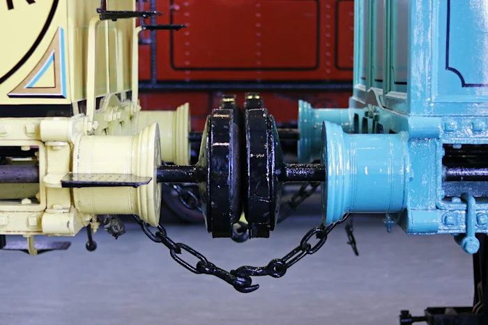 Two connected train couplers