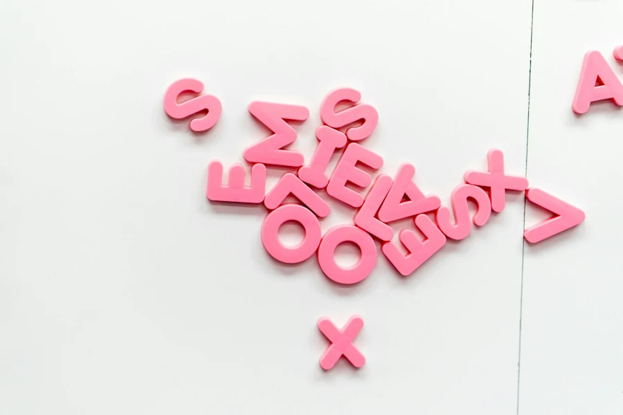 Scattered pink letters