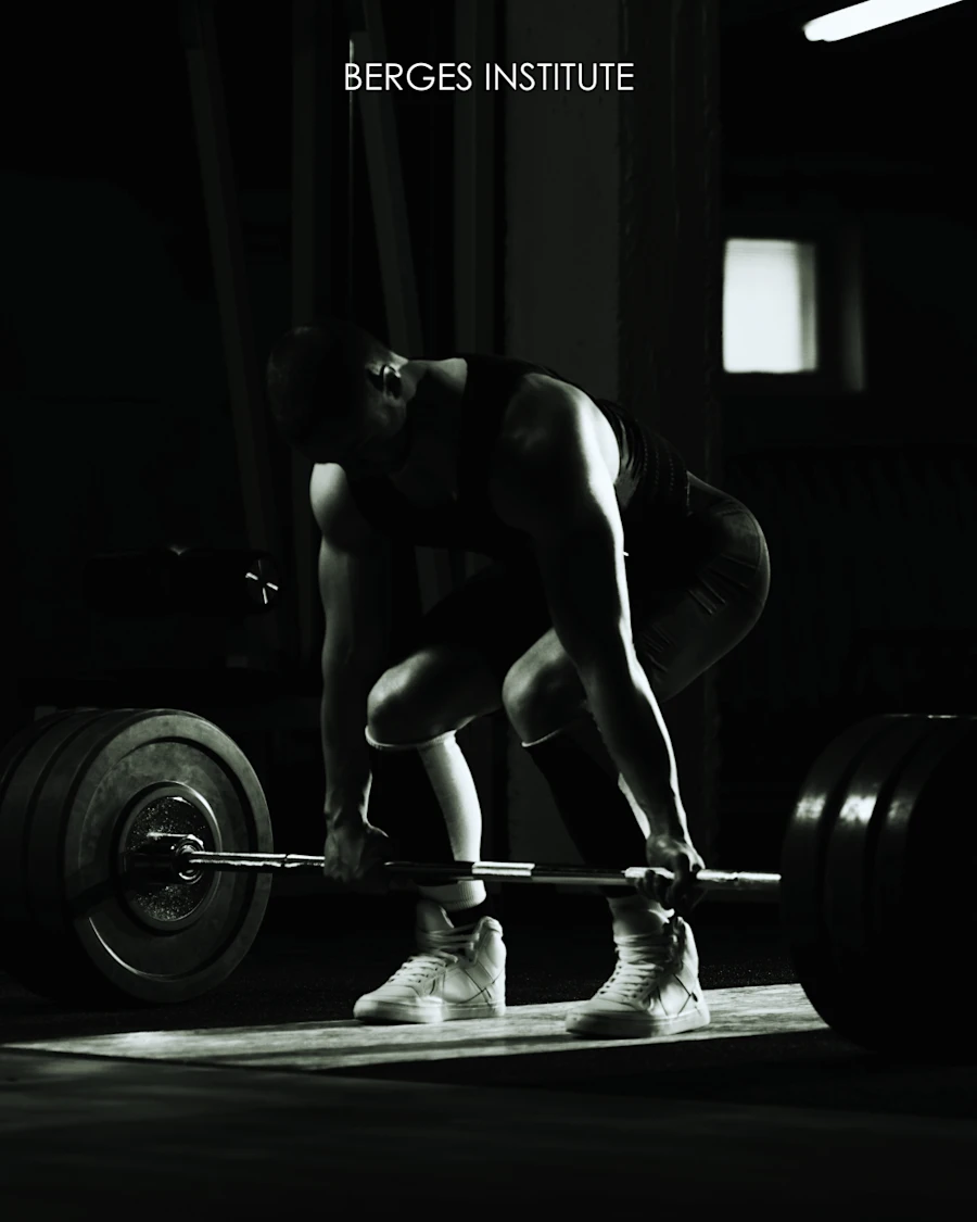 A man doing olympic weightlifting