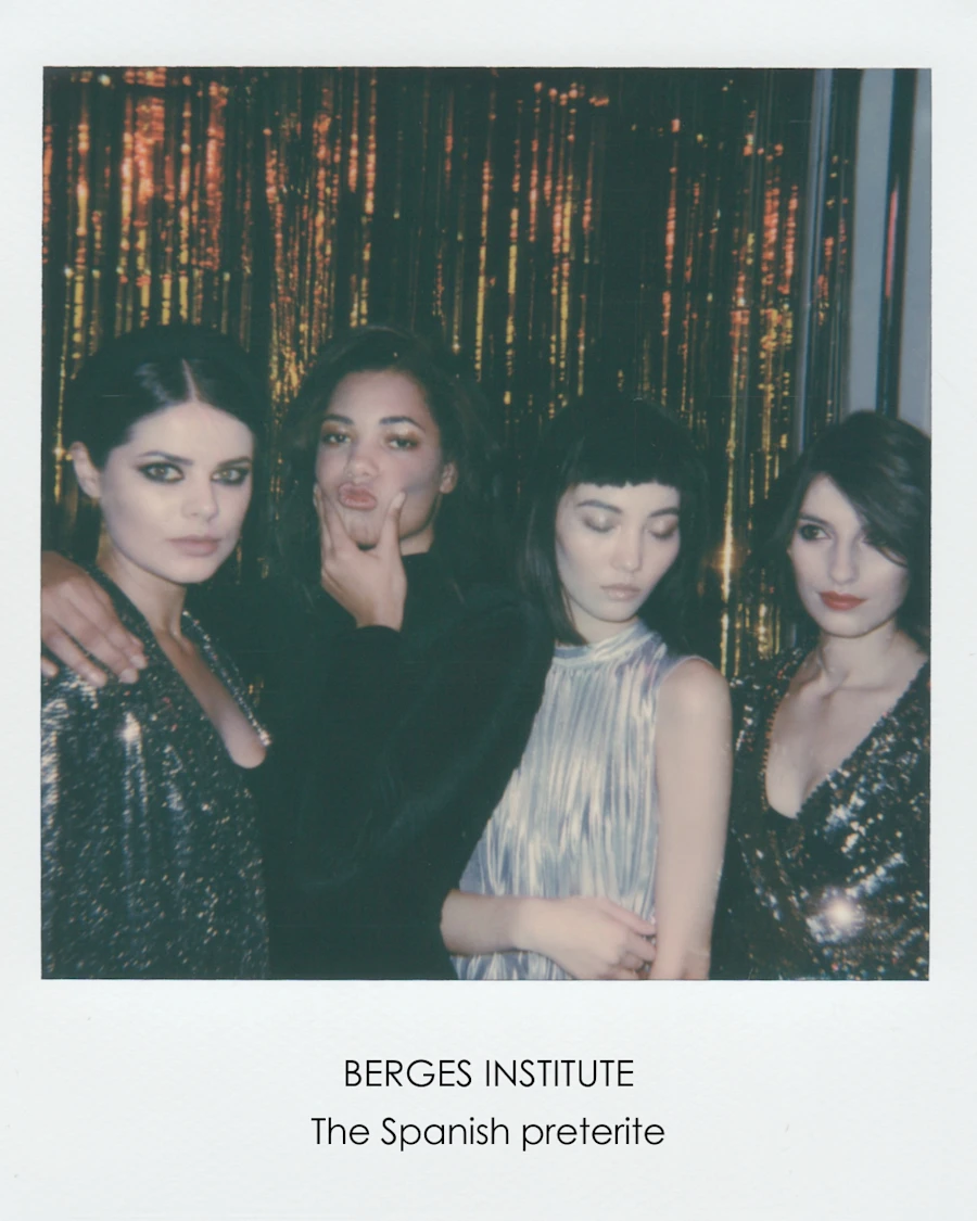 A group of 4 female friends in an old Polaroid photo