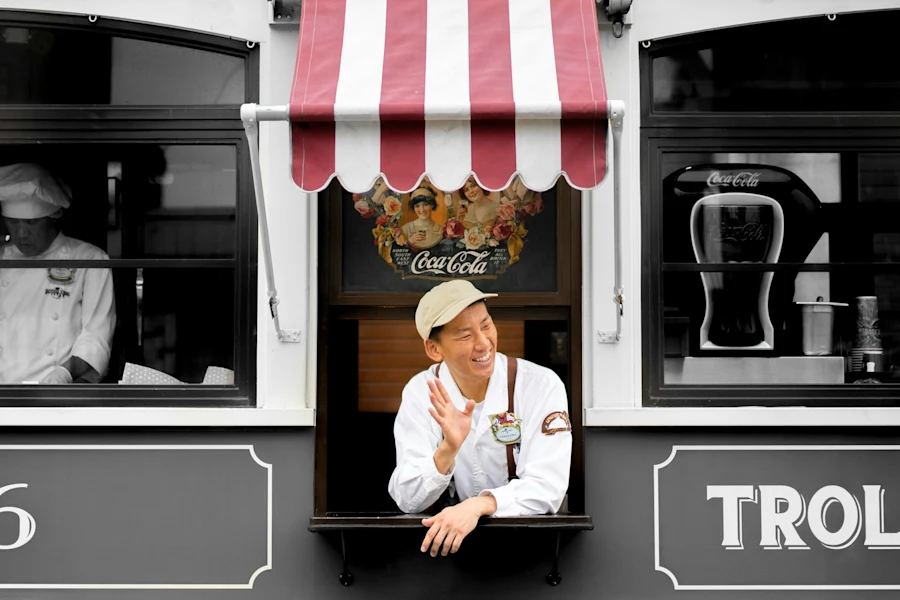 An asian man with his food business