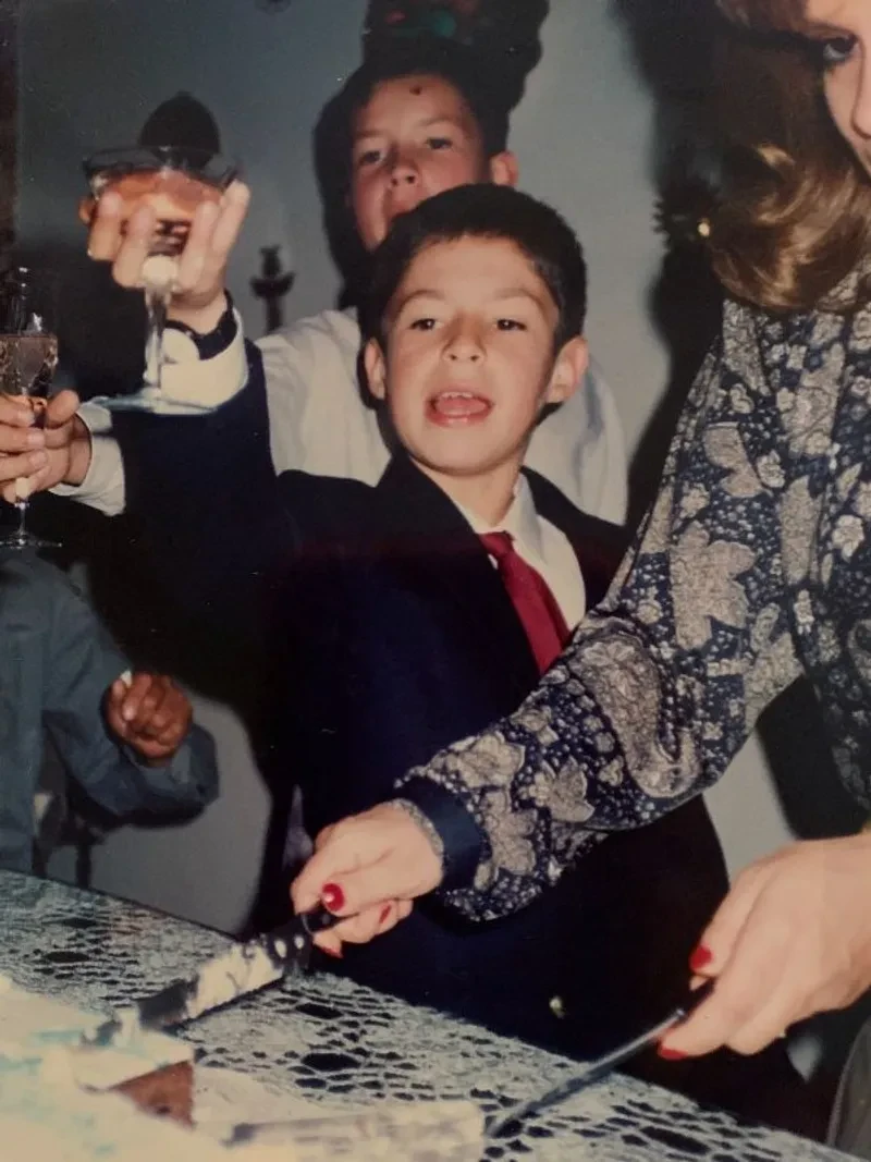 A young Nelson Navarrete celebrating with his family