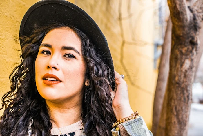 A woman wearing a hat