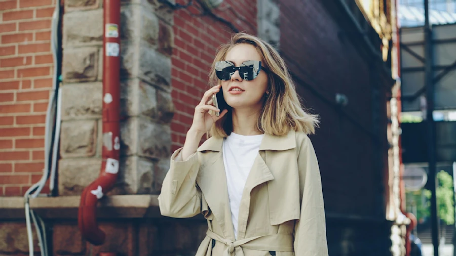 A woman speaking on the phone in the street