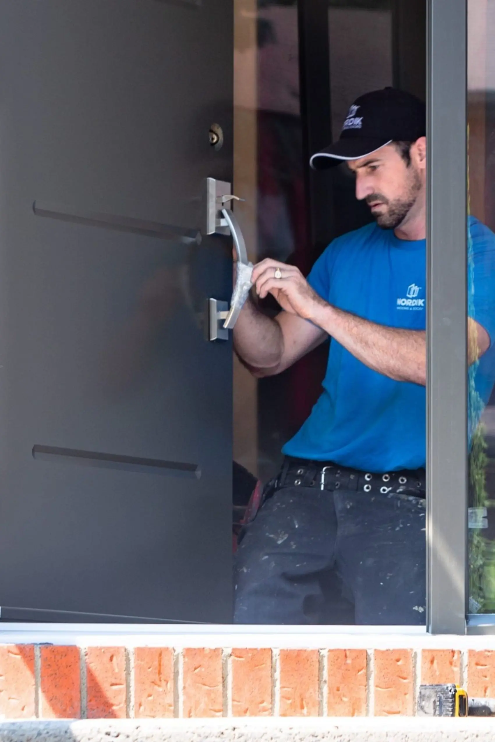 Nordik Windows and Doors. 25-Year No-Bull Warranty Service Call on Door