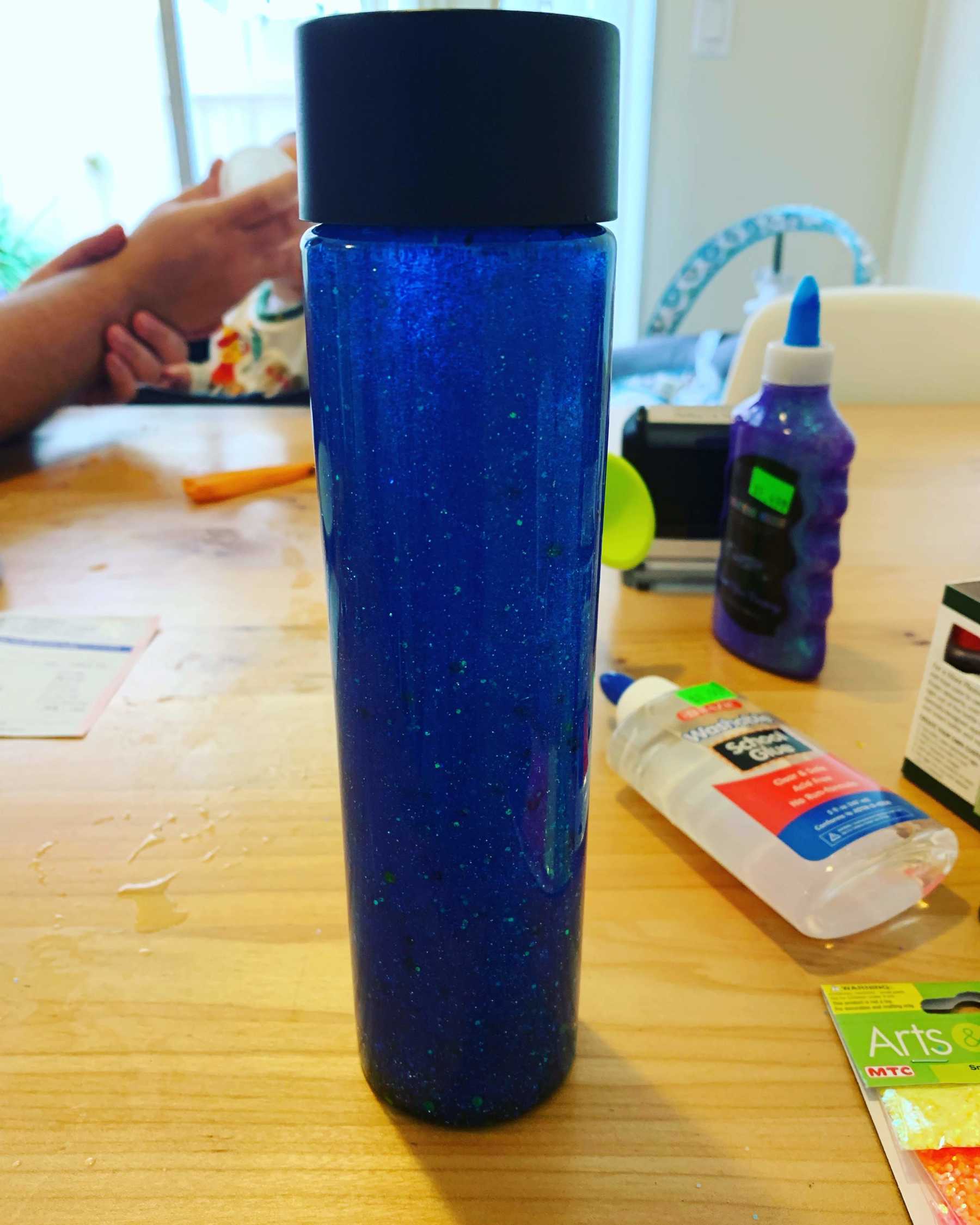 Blue Glitter Glue Sensory Bottle • Capturing Parenthood