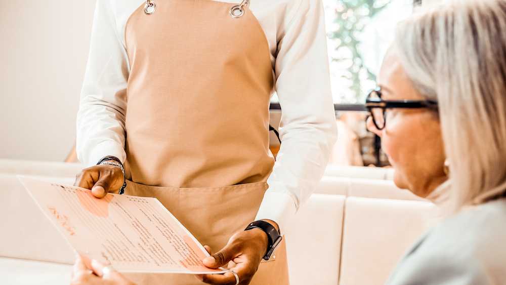 picture of server at retirement community.