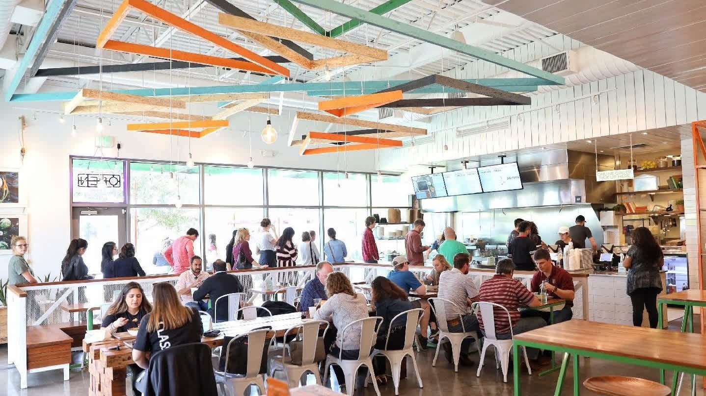 Diners in Chi'lantro receiving great customer service from Gigpro workers