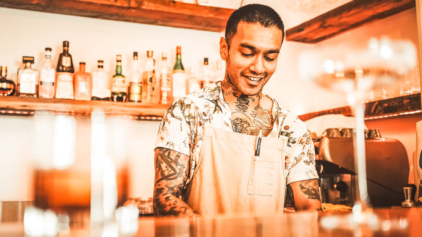 smiling attentive Gigpro bartender