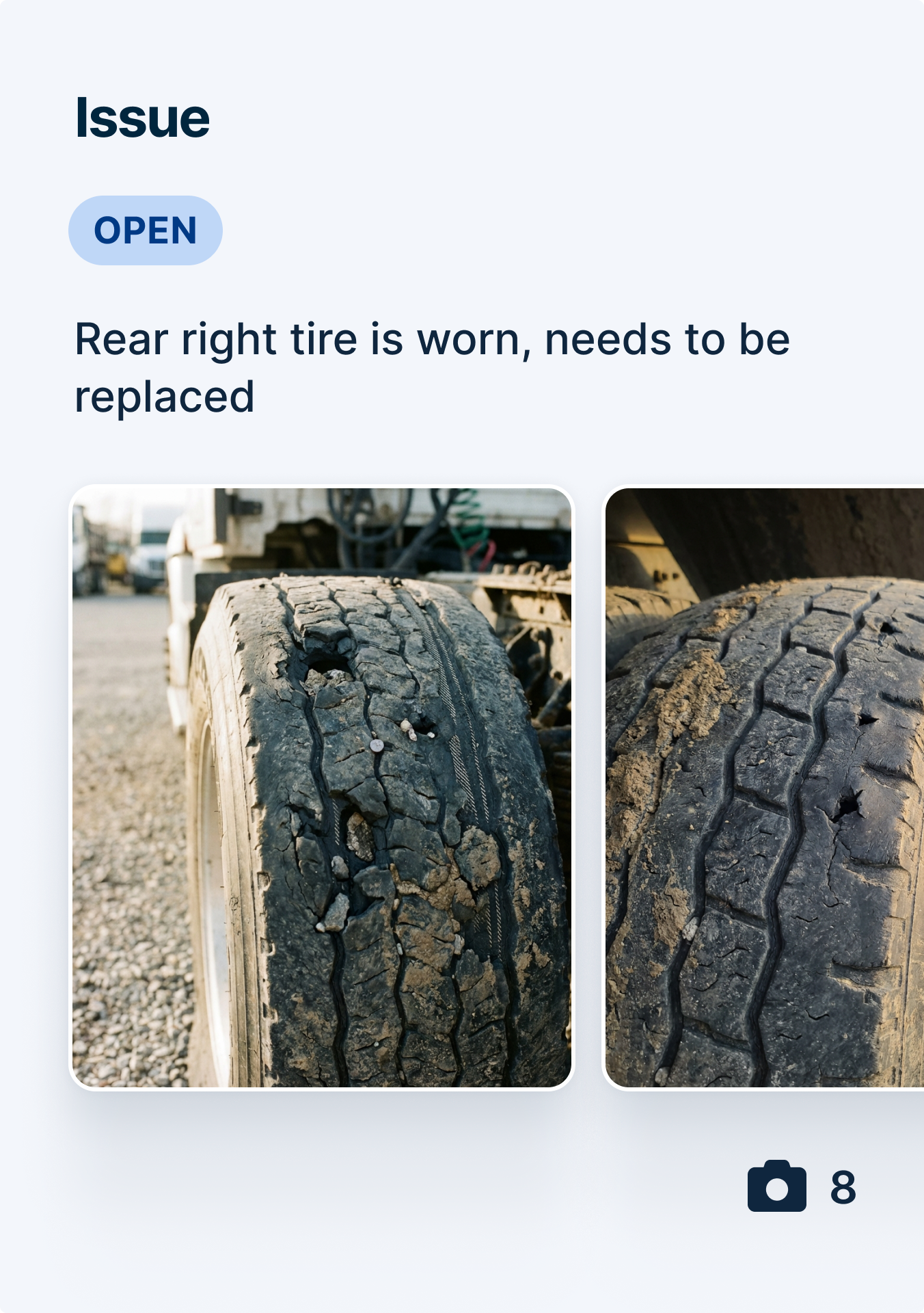 Two images of a severely worn truck tire with cracked tread and visible damage, marked as an open issue for replacement.