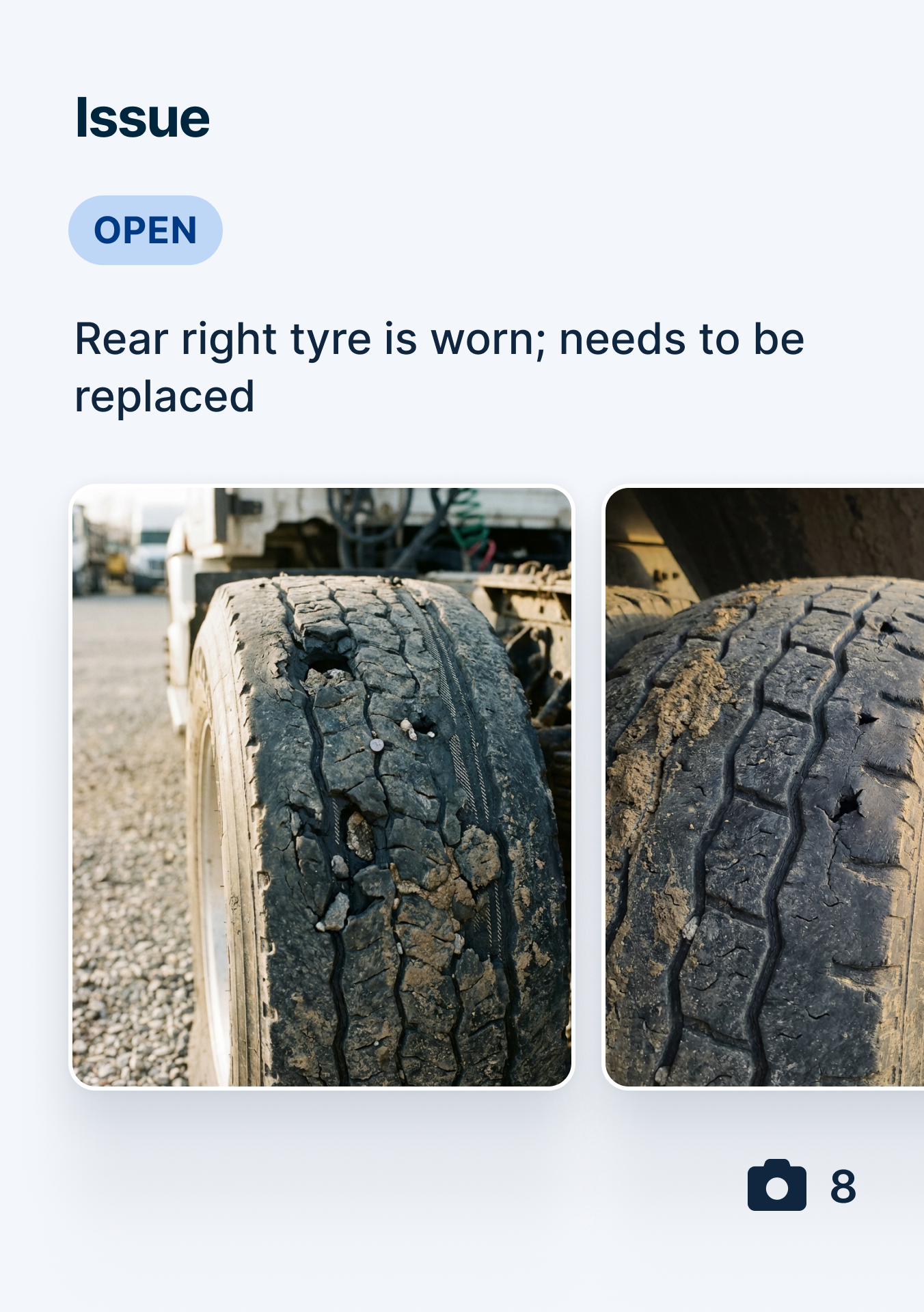 Two images of a severely worn truck tire with cracked tread and visible damage, marked as an open issue for replacement.