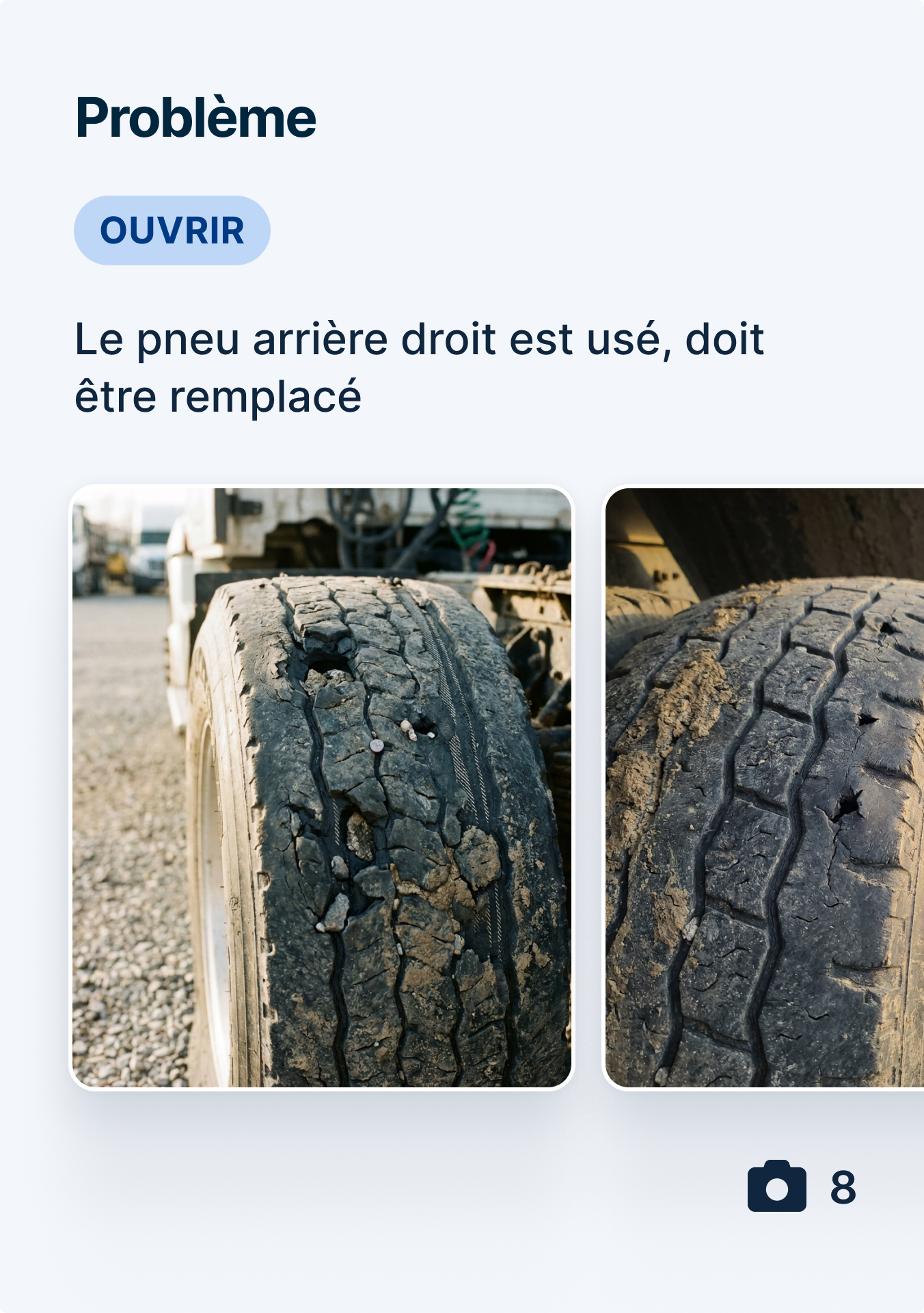 Two images of a severely worn truck tire with cracked tread and visible damage, marked as an open issue for replacement.