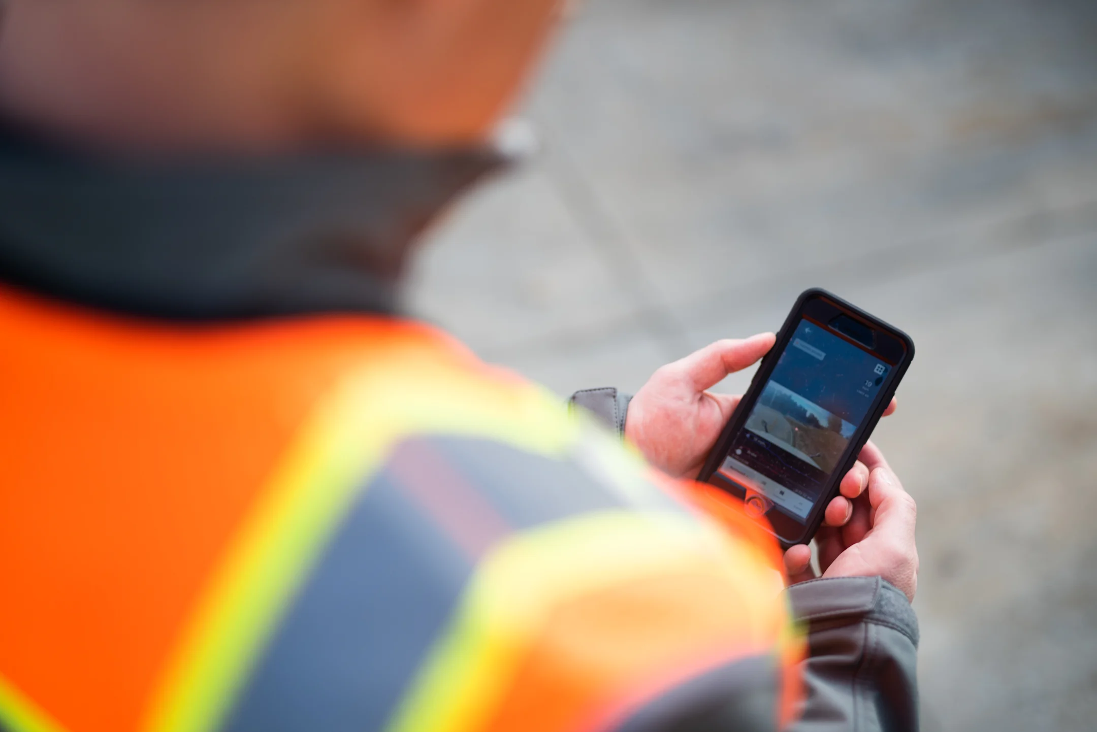 Worker using mobile device