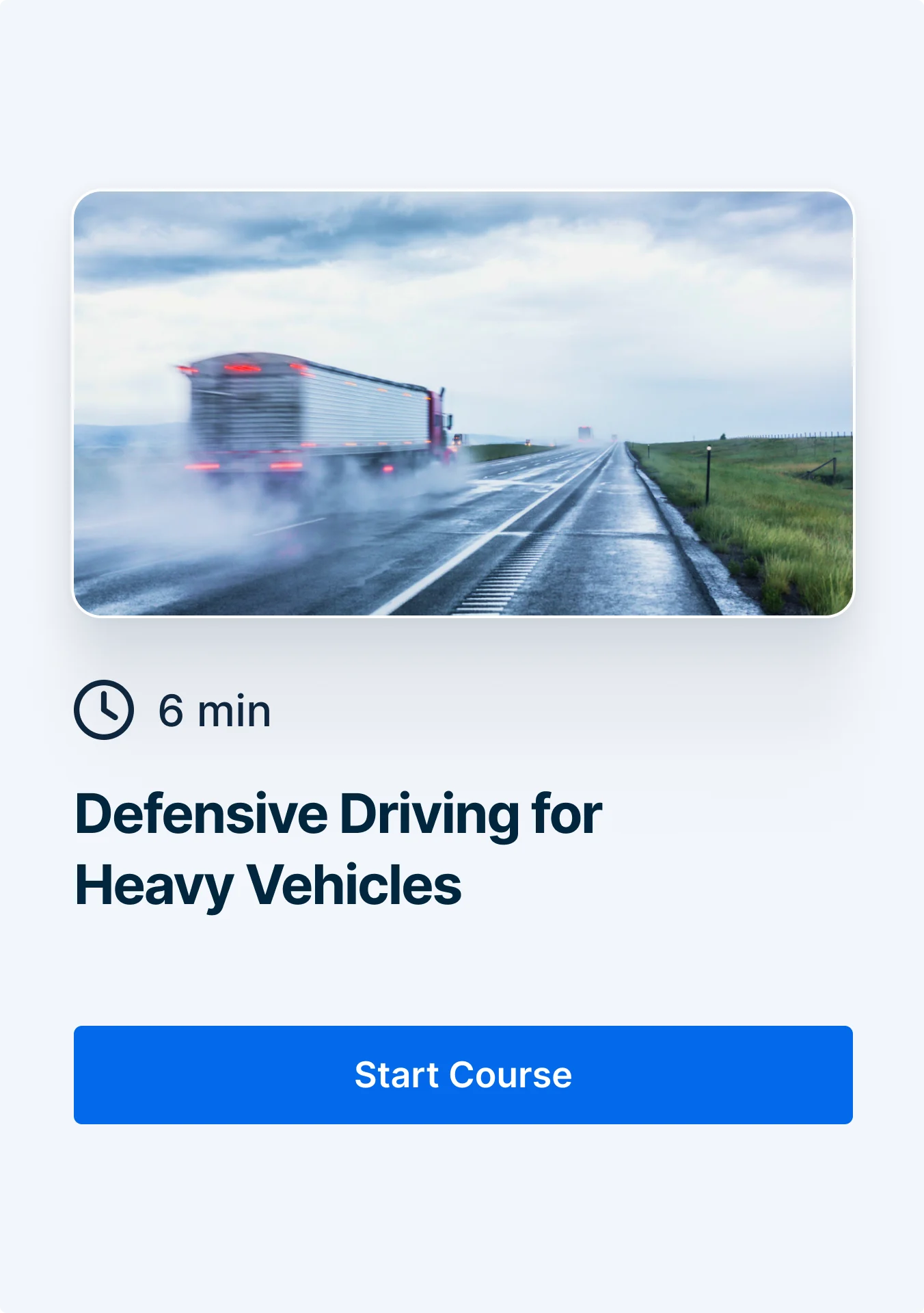 Semi-truck driving on wet highway in rainy conditions, creating spray as it travels down a rural road.