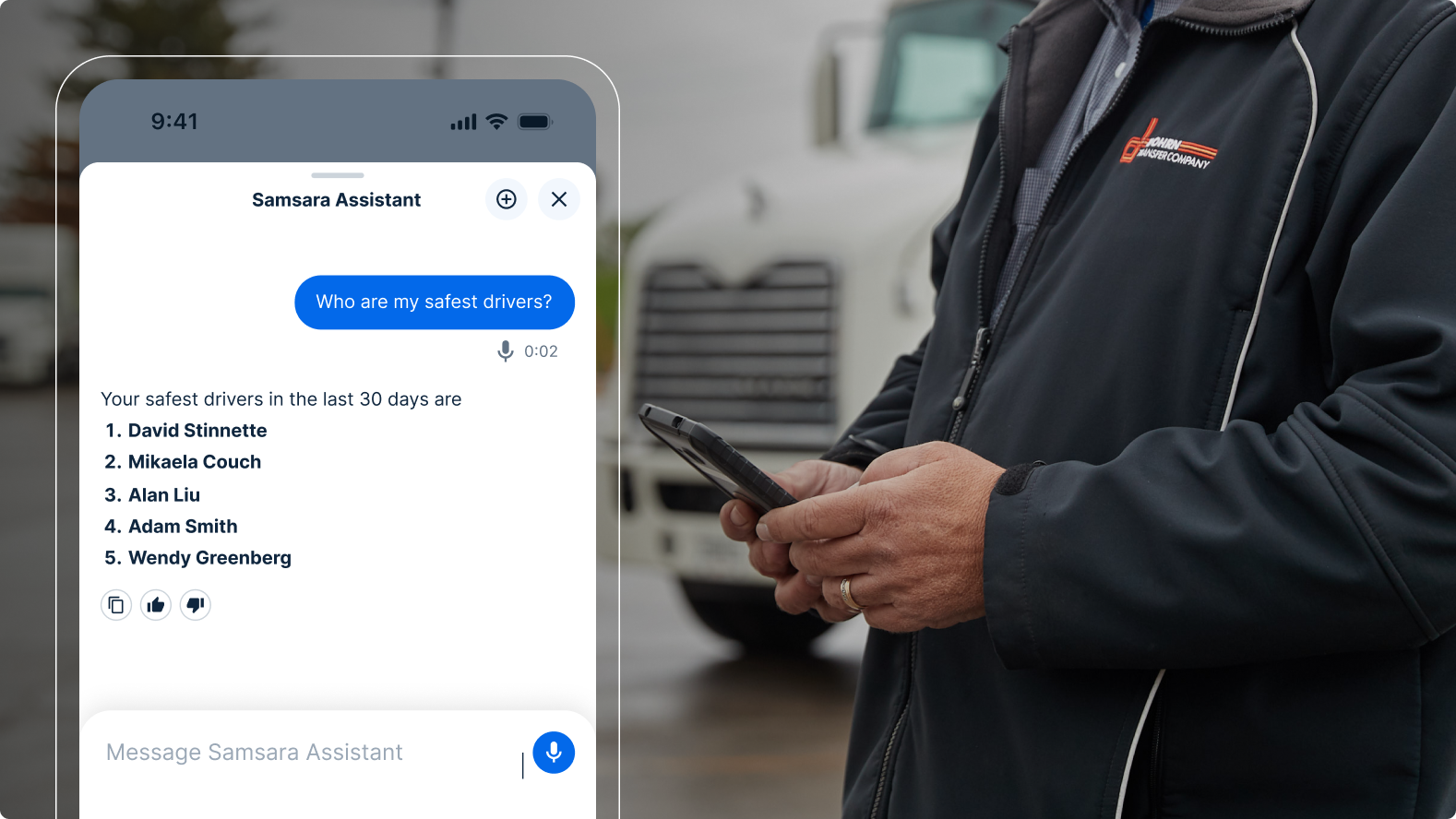Person in logistics company jacket checking Samsara Assistant app showing a list of safest drivers on smartphone.