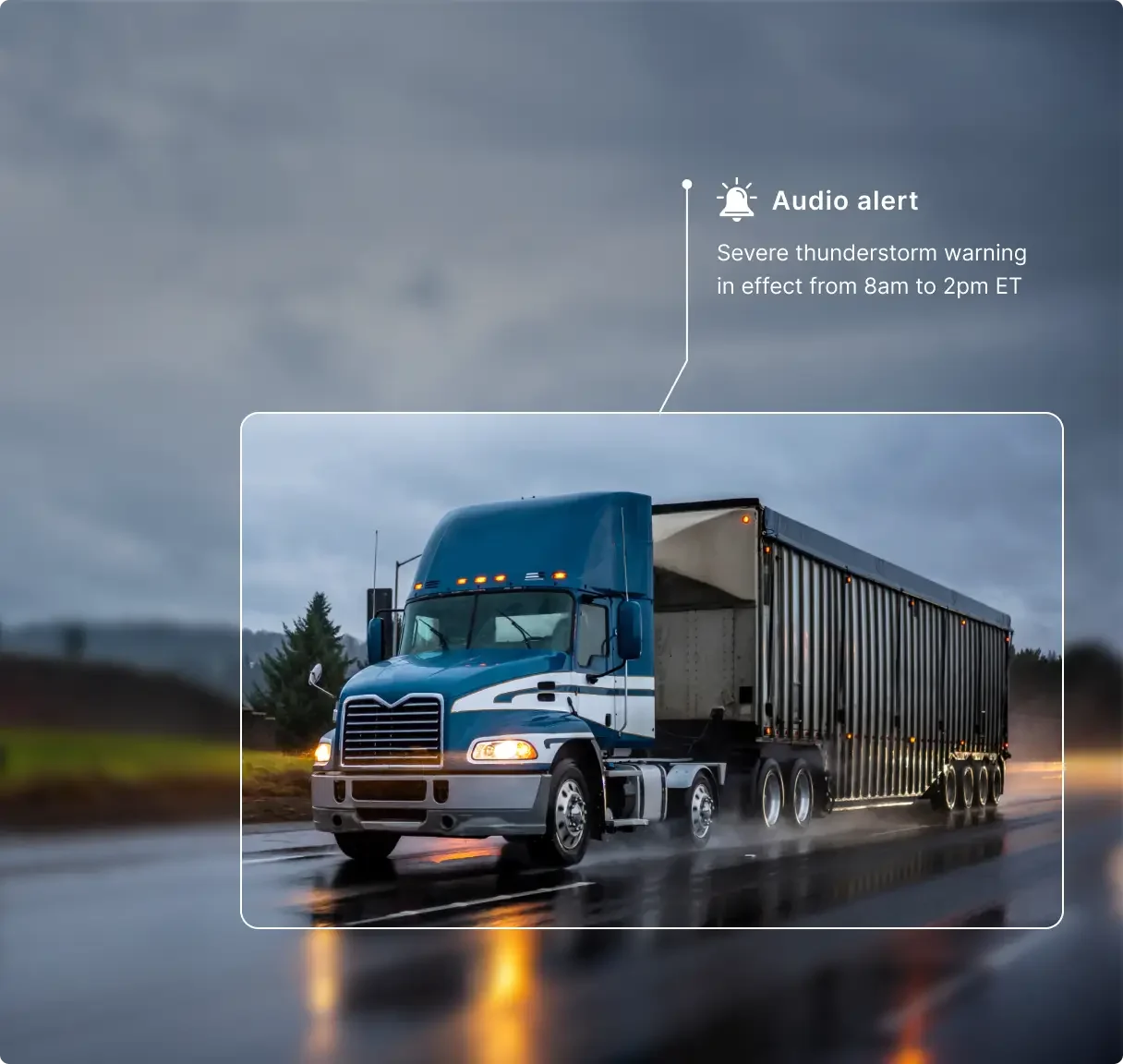 Blue semi-truck driving on wet road during stormy weather with severe thunderstorm warning alert displayed above.