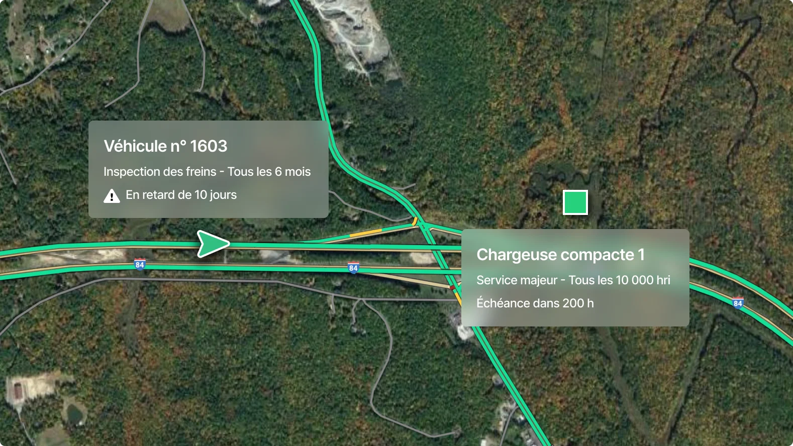 Vue aérienne d'une carte avec alertes de maintenance : retard d'inspection des freins et entretien à venir pour le Skid Steer