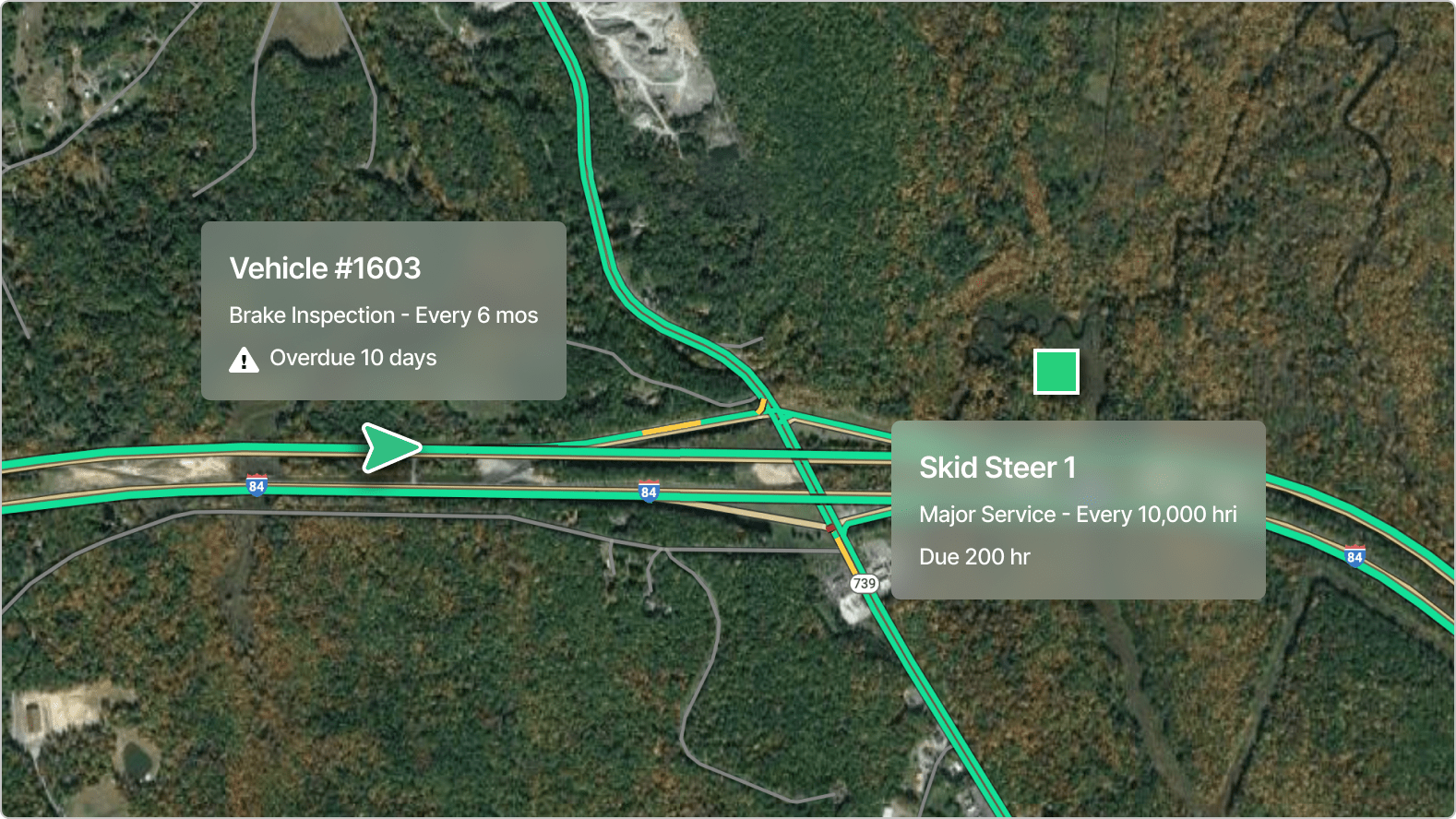 Aerial map view showing vehicle maintenance tracking with alerts for Vehicle #1603 and Skid Steer 1 equipment service status