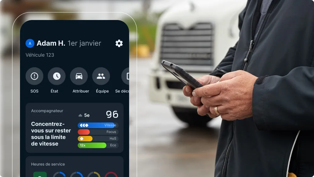 Personne utilisant une appli de gestion de flotte sur un téléphone avec interface de suivi, camion en arrière-plan.