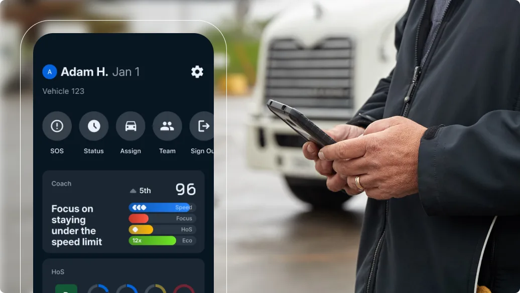 Person using a fleet management app on smartphone with vehicle tracking interface, truck visible in background.