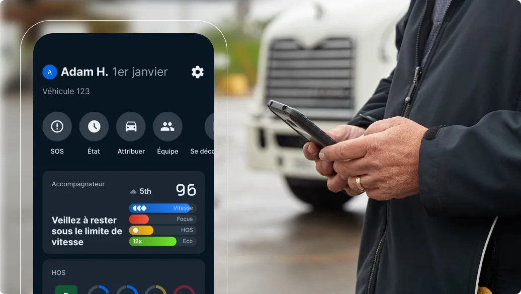 Personne utilisant une application de gestion de flotte sur un smartphone avec suivi de véhicule ; un camion en arrière-plan.