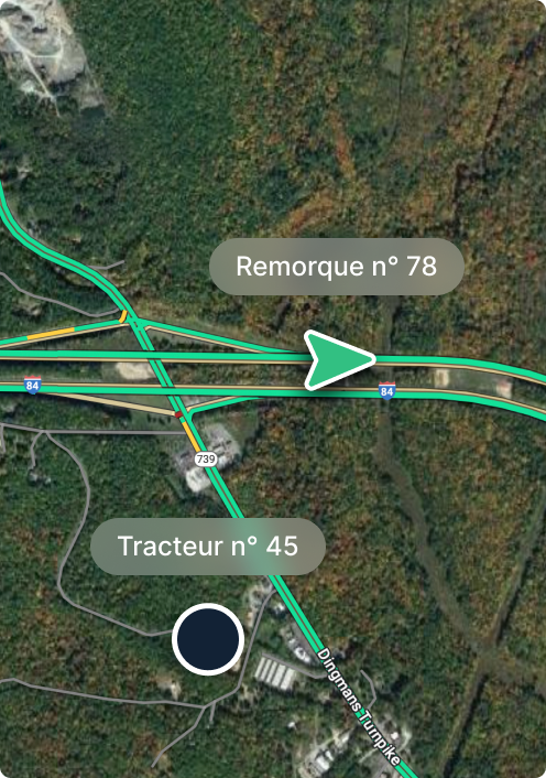 Vue aérienne d'un échangeur autoroutier avec les marqueurs de la remorque n°78 et du tracteur n°45, dans une zone forestière.