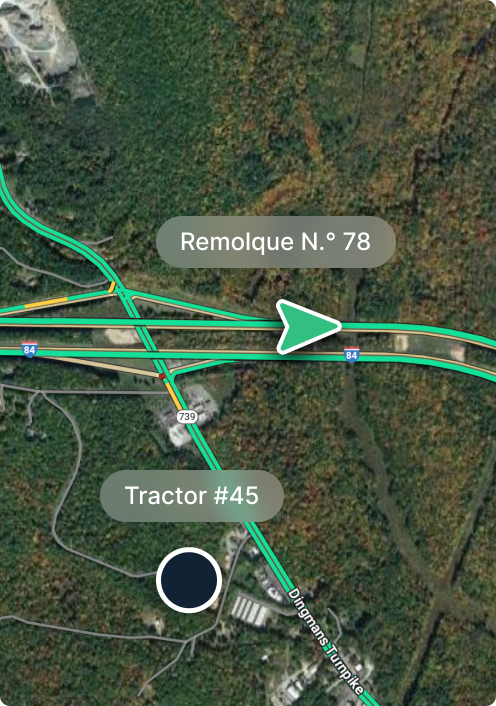 Vista aérea del mapa del intercambio de autopistas con marcadores para el remolque #78 y el tractor #45, rodeado de bosque.