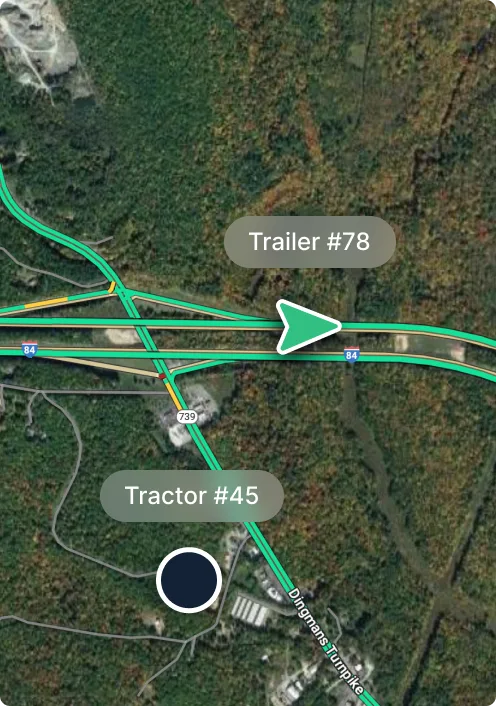 Aerial map view showing highway interchange with markers for Trailer #78 and Tractor #45, surrounded by forested area.
