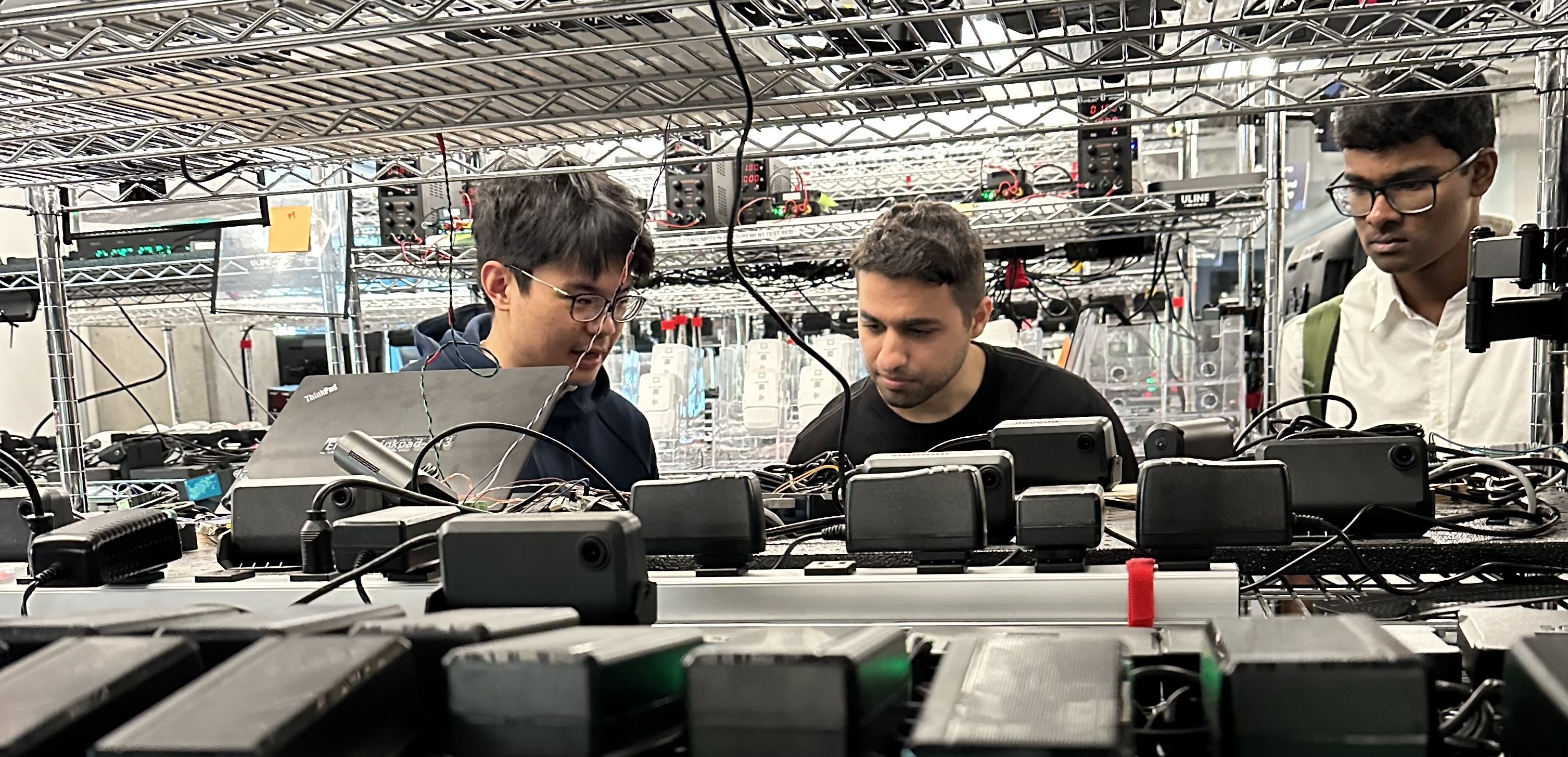 Samsara interns looking at hardware